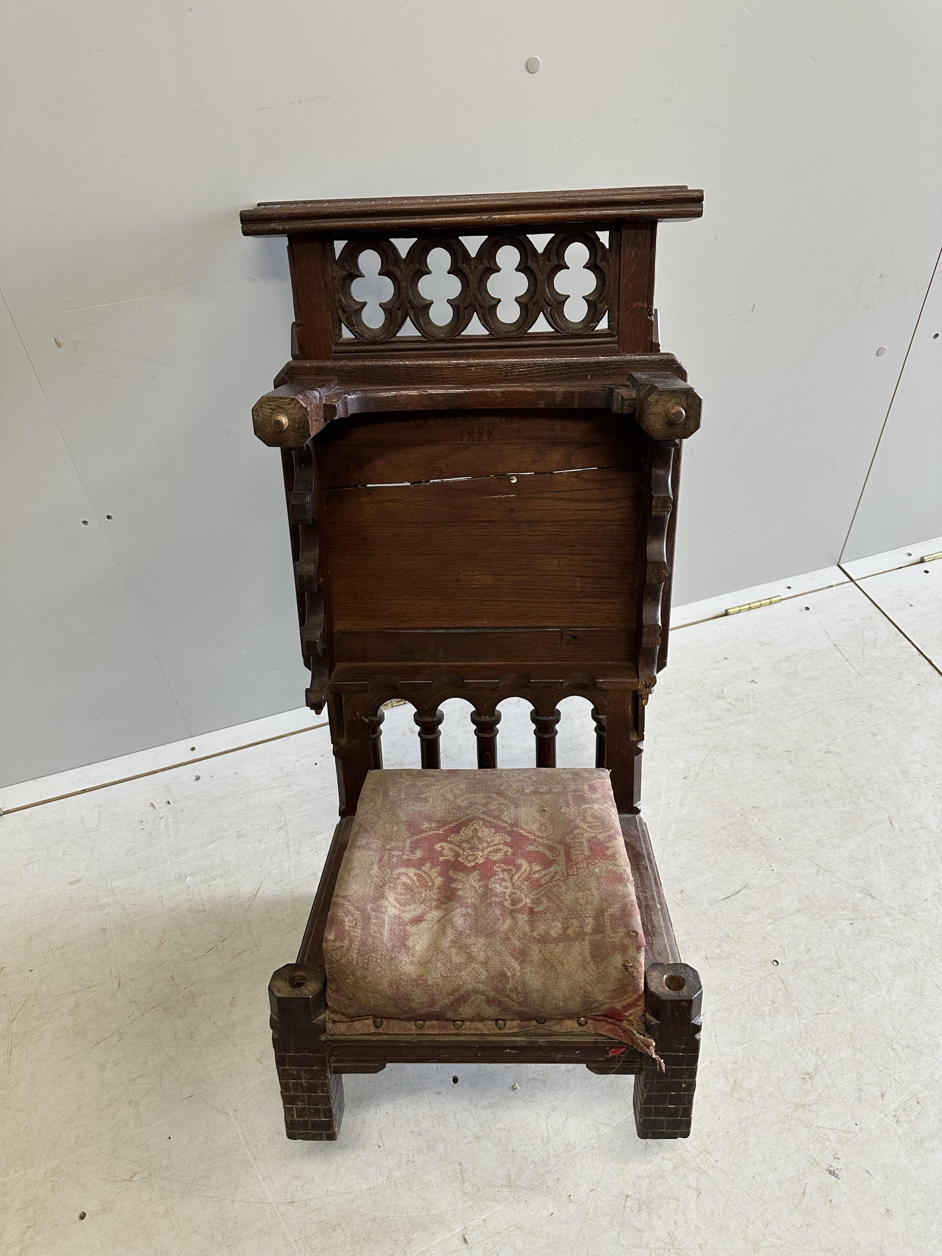 A 19th century French Gothic Revival carved oak prie dieu, width 44cm, depth 40cm, height 89cm. Condition - fair